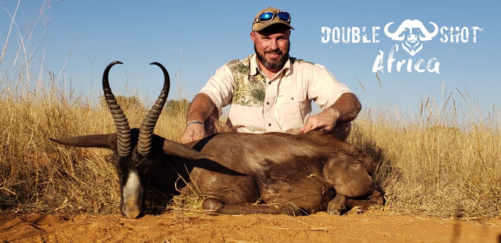 African safari trophy taken with Double Shot Outfitters